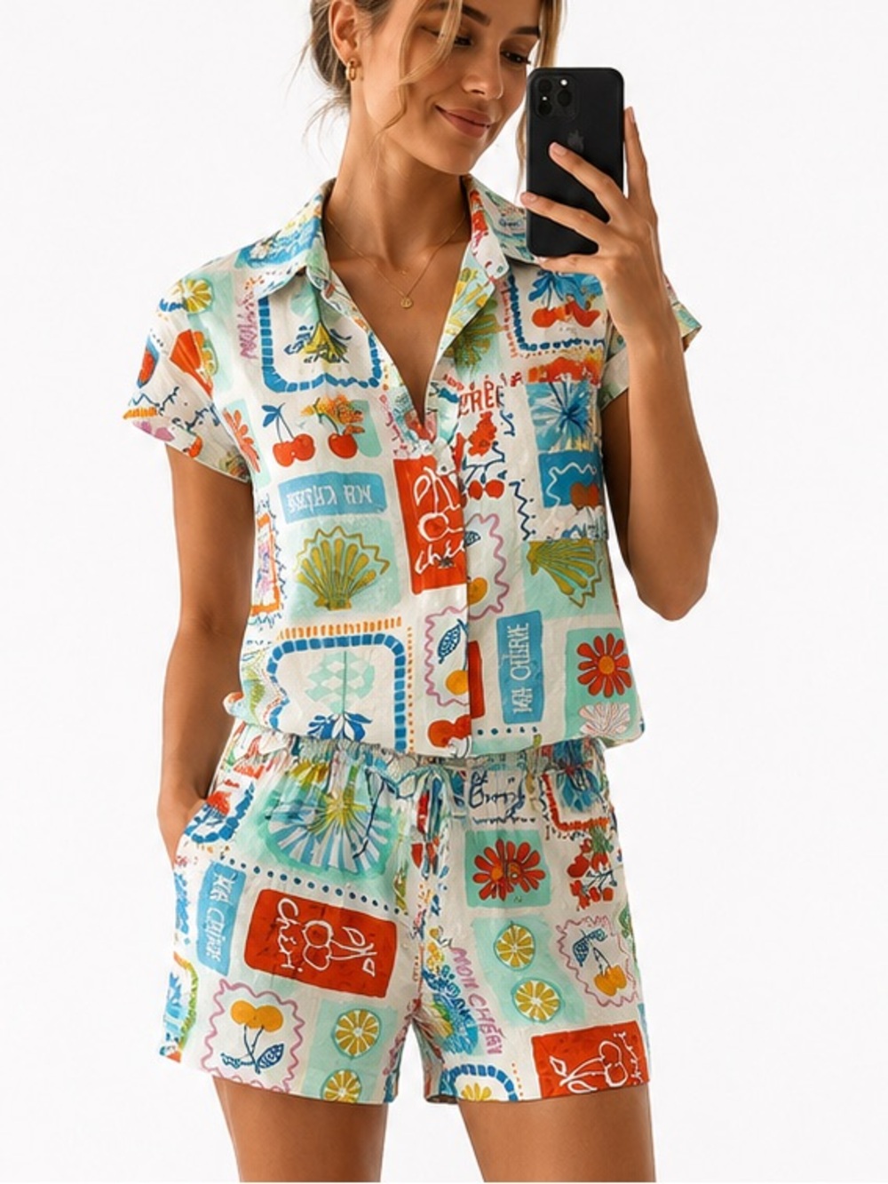 Printed Short Sleeve Button-Up Romper in Multi